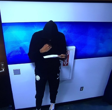 PHOTO Kevin Durant Looking Like Slim Reaper Staring At Stat Sheet In Tunnel