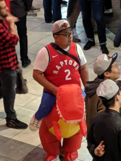 PHOTO Raptors Fan Riding Inflatable Raptor