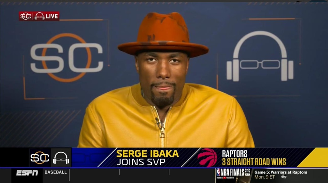 PHOTO Serge Ibaka Wearing The Brightest Yellow Jacket And Brown Hat You Will Ever See