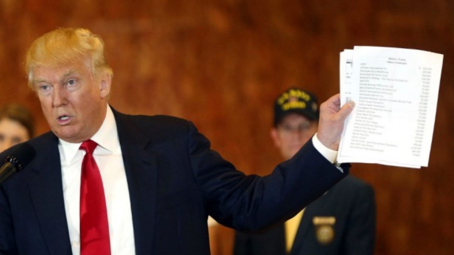 PHOTO Donald Trump Holding His Tax Returns Saying Look At Them