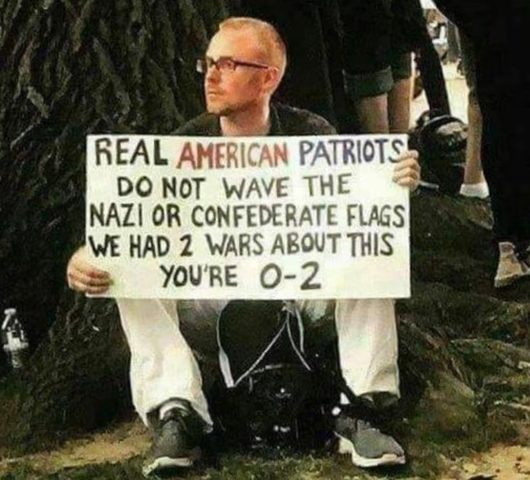 PHOTO Anti Proud Boys Sign That Says Real American Patriots do Not Wave The Nazi Or Confederate Flag