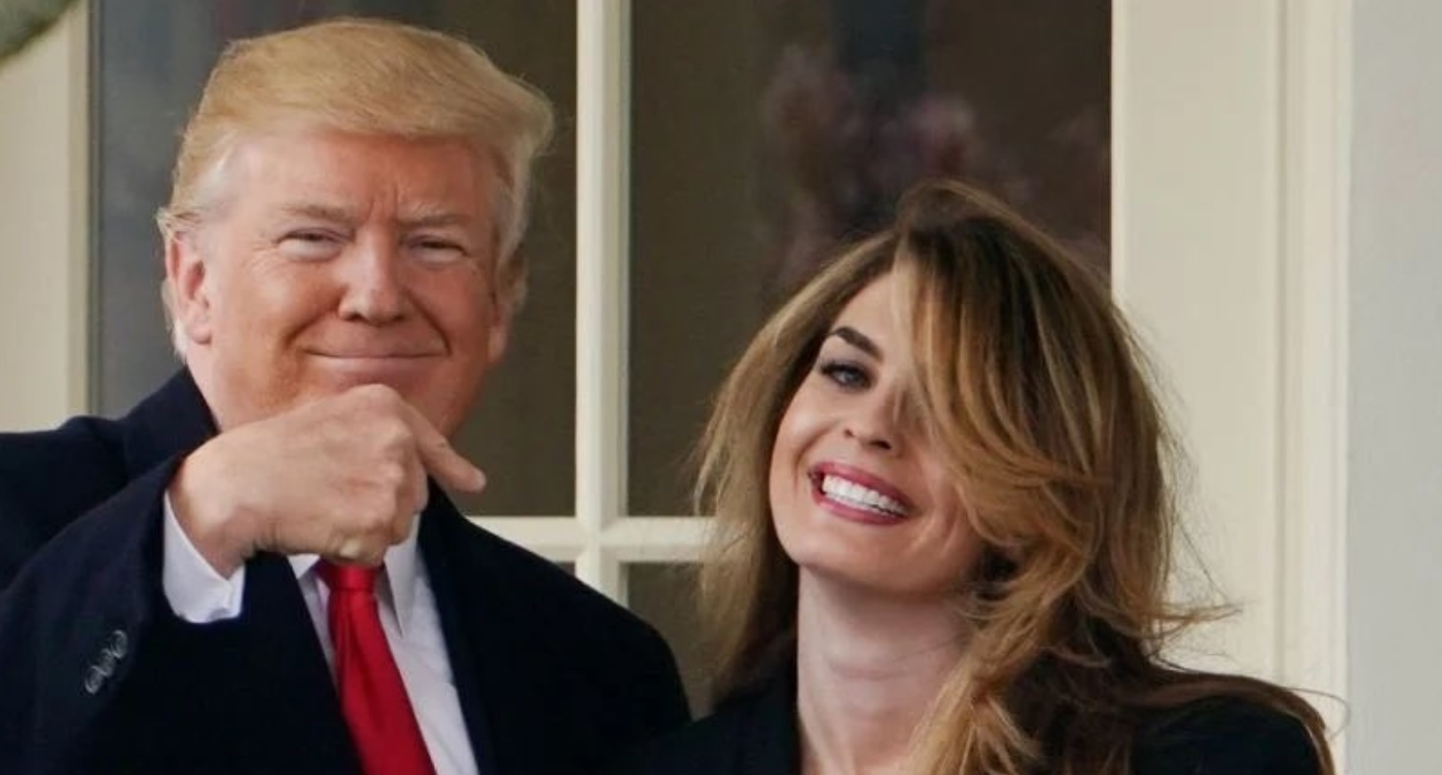 PHOTO Donald Trump Pointing At Hope Hick's Smiling Face