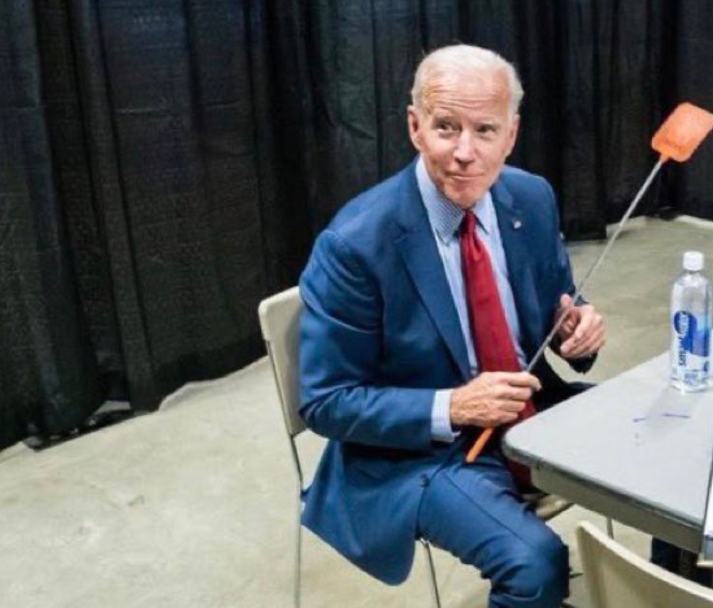 PHOTO Joe Biden Mocking Mike Pence By Holding A Fly Swatter