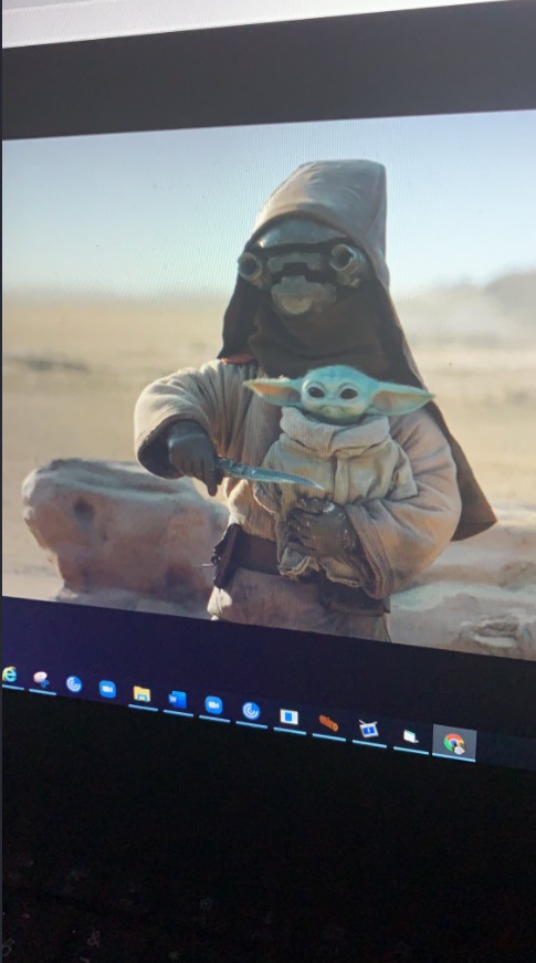 PHOTO Alien Holding A Knife To Baby Yoda's Throat