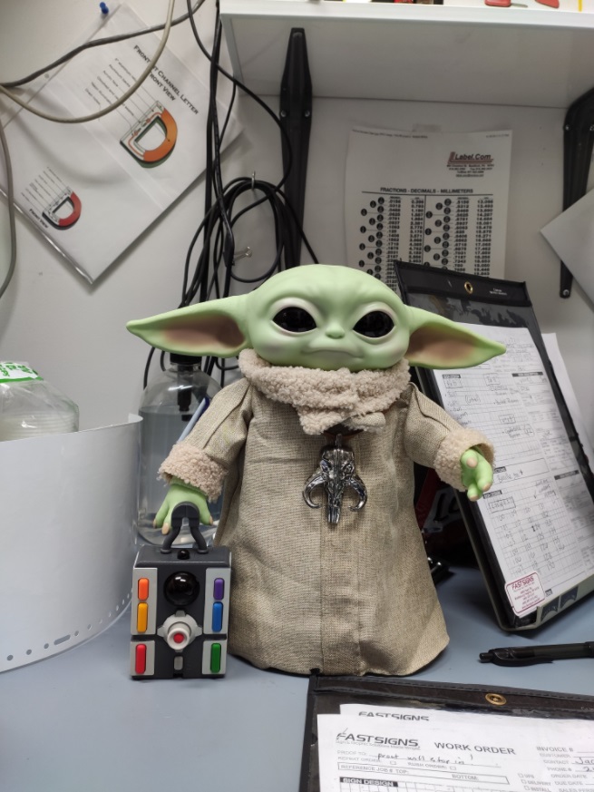 PHOTO Baby Yoda Working A Day Job