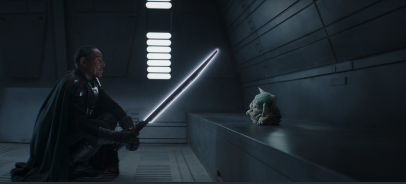 PHOTO Moff Gideon Using Light Saber On Baby Yoda