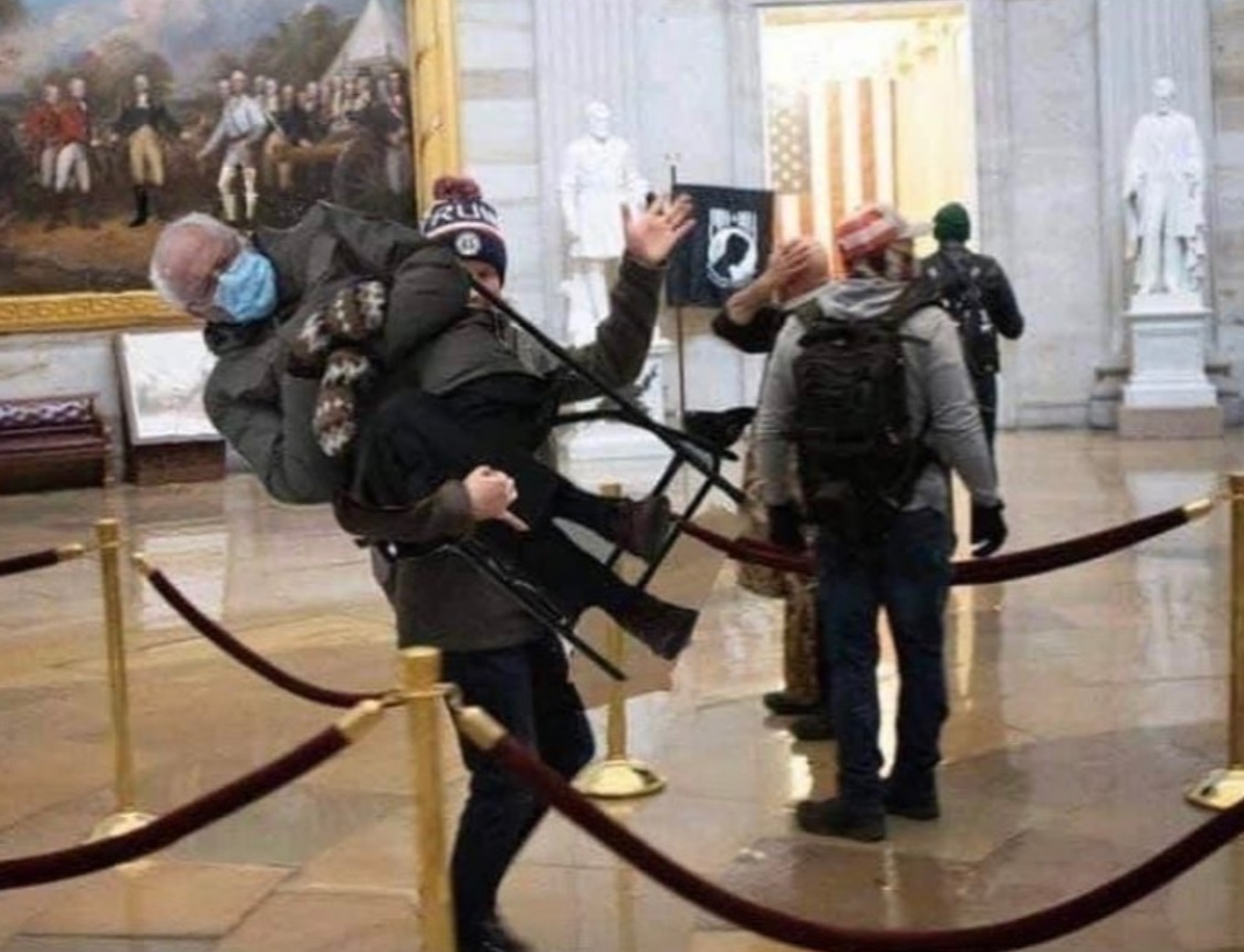 PHOTO Bernie Sanders Being Carried Out Of The Capitol During The Insurrection Meme