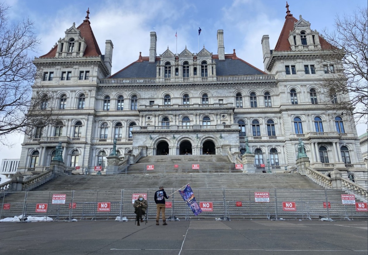 PHOTO Bernie Sanders Sitting At Empty NYS Capitol Trump Protest