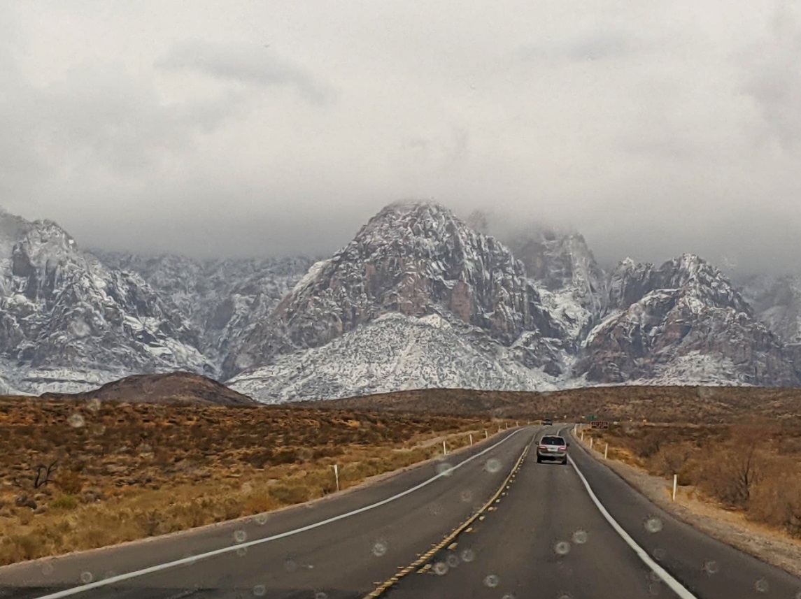 PHOTO Mountains Above Red Rock Canyon Covered In Snow