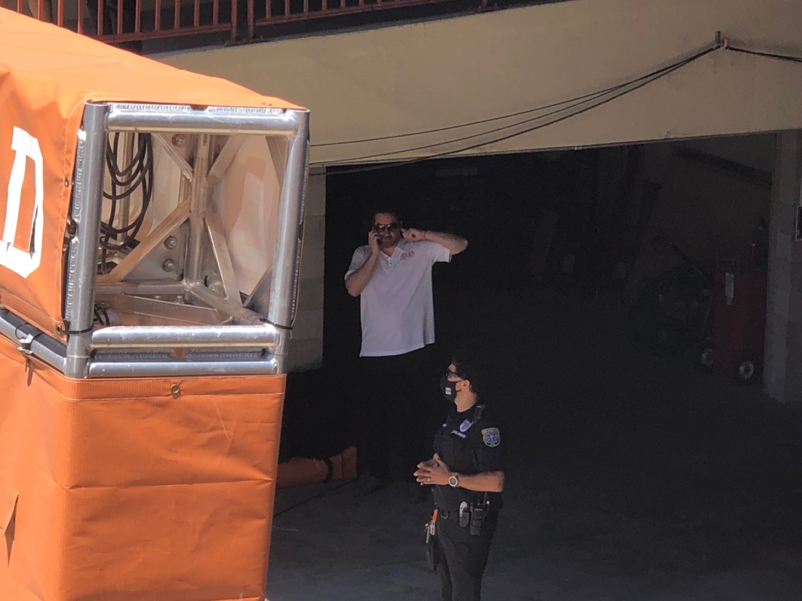 PHOTO Chris Beard On The Phone With A Recruit While At Texas Football Spring Game