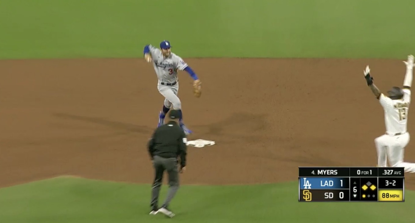 PHOTO Manny Machado Trying To Break Up Inning Ending Double Play By Holding His Hands Up