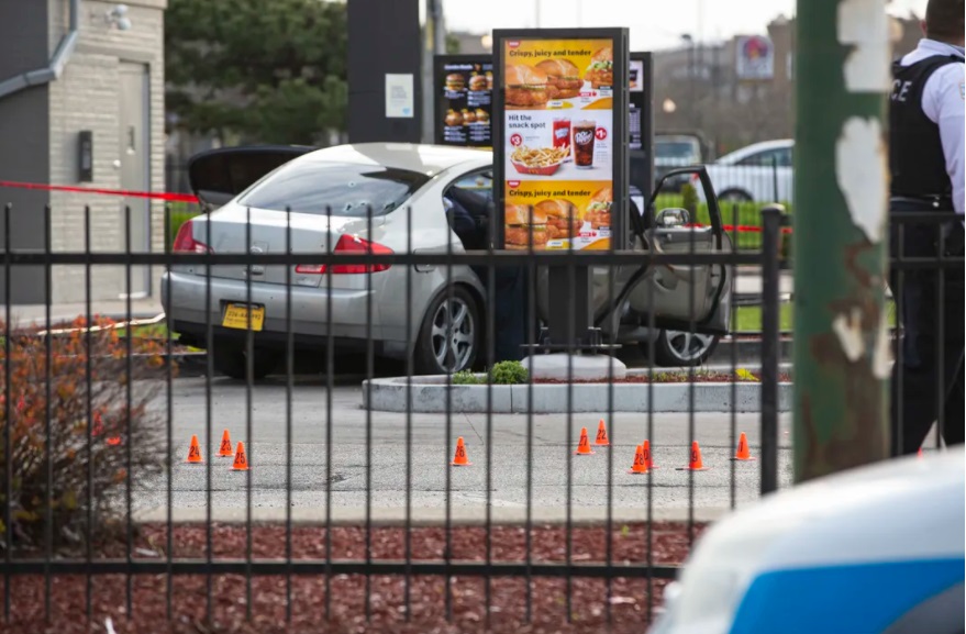 PHOTO Shell Casing From Gun All Over The Ground At McDonald's Drive Thru In Chicago Where Shooting Happened