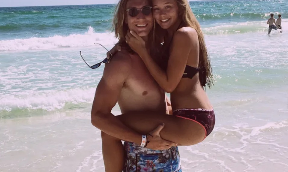 PHOTO Trevor Lawrence's Wife Gives Great View Of Her Legs In Bikini While Trevor Holds Her On Beach