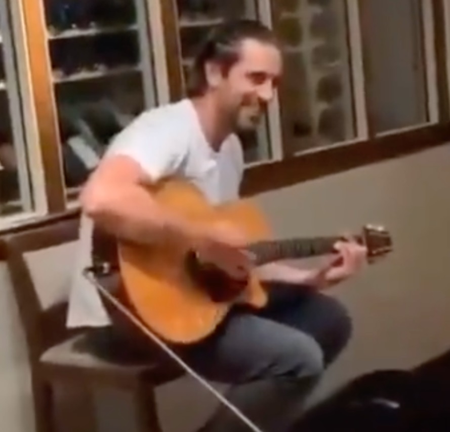PHOTO Aaron Rodgers Playing An Acoustic Guitar With An Amp And Looks Like He Hasn't Washed His Hair In Months