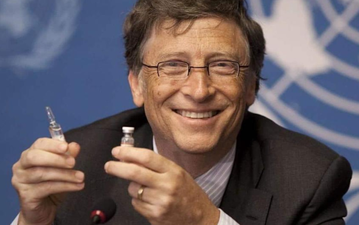 PHOTO Bill Gates Holding COVID Vaccine And Smirking