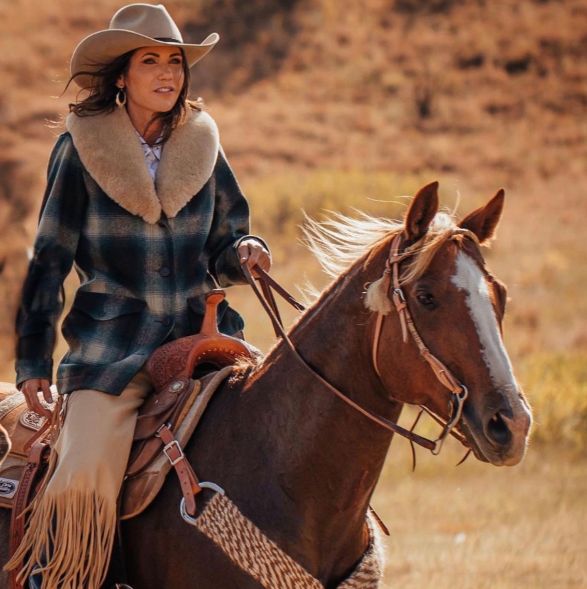 PHOTO Kristi Noem Riding A Horse In The Wilderness In A Cowboy Hat Like A True Cowgirl