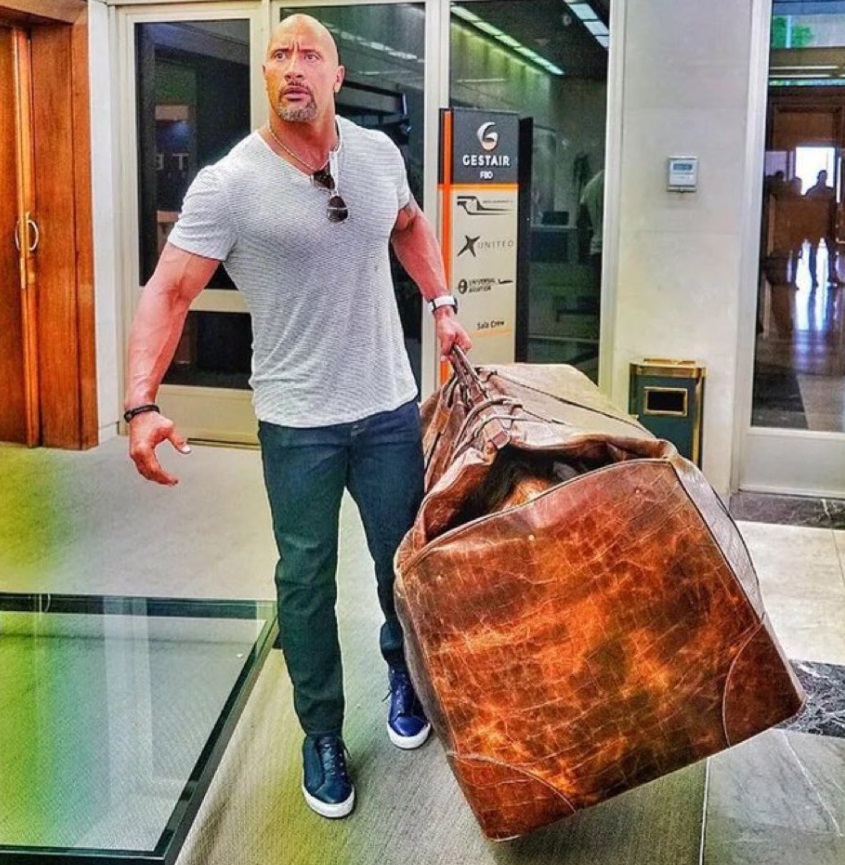 PHOTO Dwyane The Rock Johnson Carrying Duffel Bag The Size Of Horse Into Airport