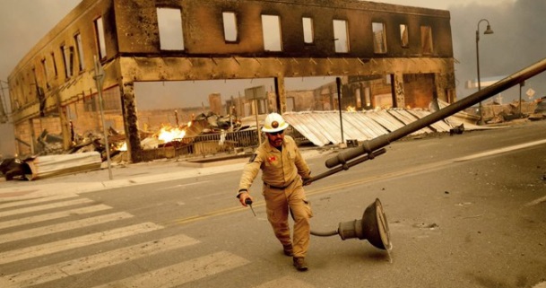 PHOTO Firefighter Clears Downed Light Post In Greenville CA