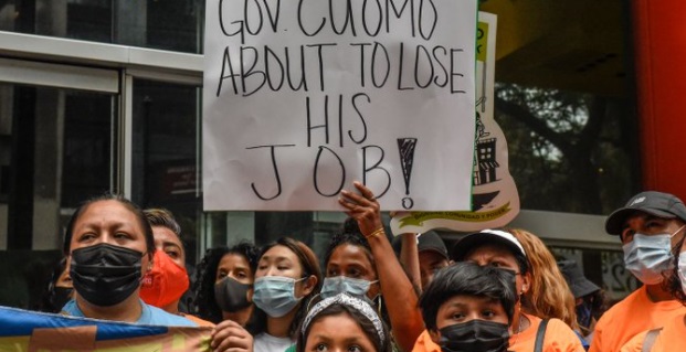 PHOTO Group Of Democrats Holding Sign That Says Gov Cuomo About To Lose His Job