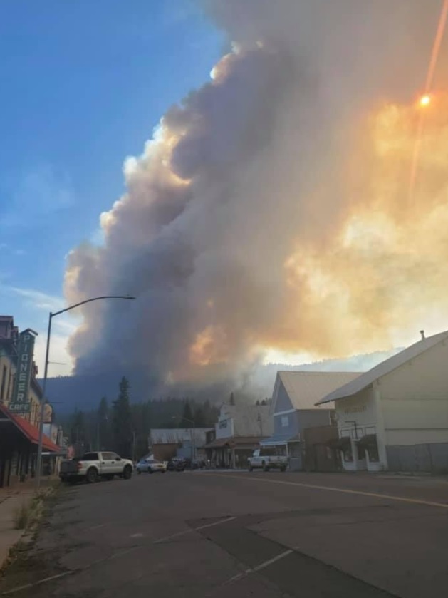 PHOTO Of Flames Overtaking Hill Mountains And Invading Main Street On Monday Before It All Burnt Down