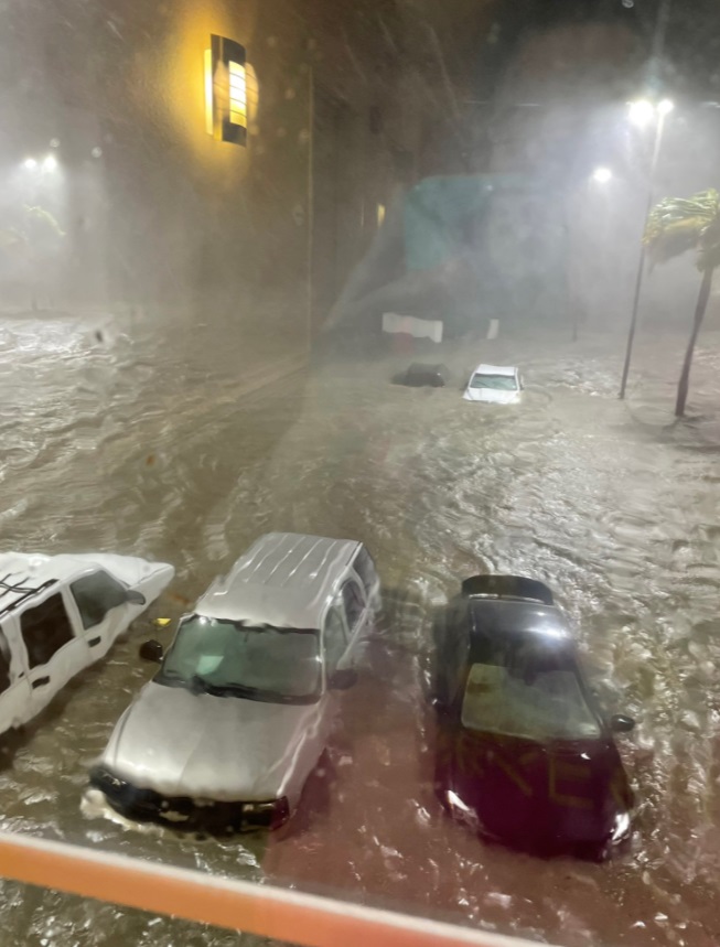 PHOTO Parking Lot In Laplace Louisiana Flooded Cars Damaged By Water Up To The Roofs 2