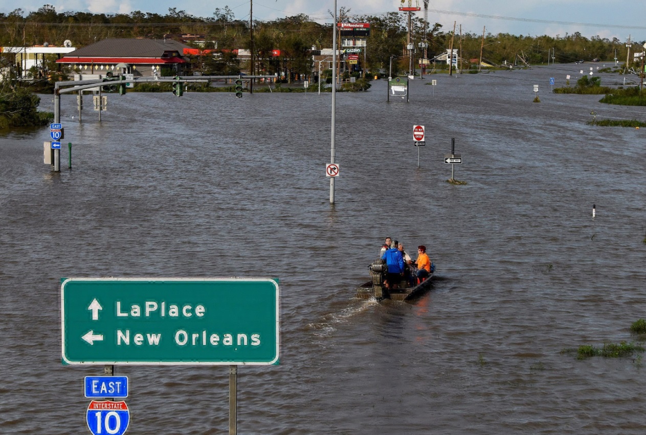 PHOTO People Riding In Boat Down Highway 51 In LaPlace Louisiana