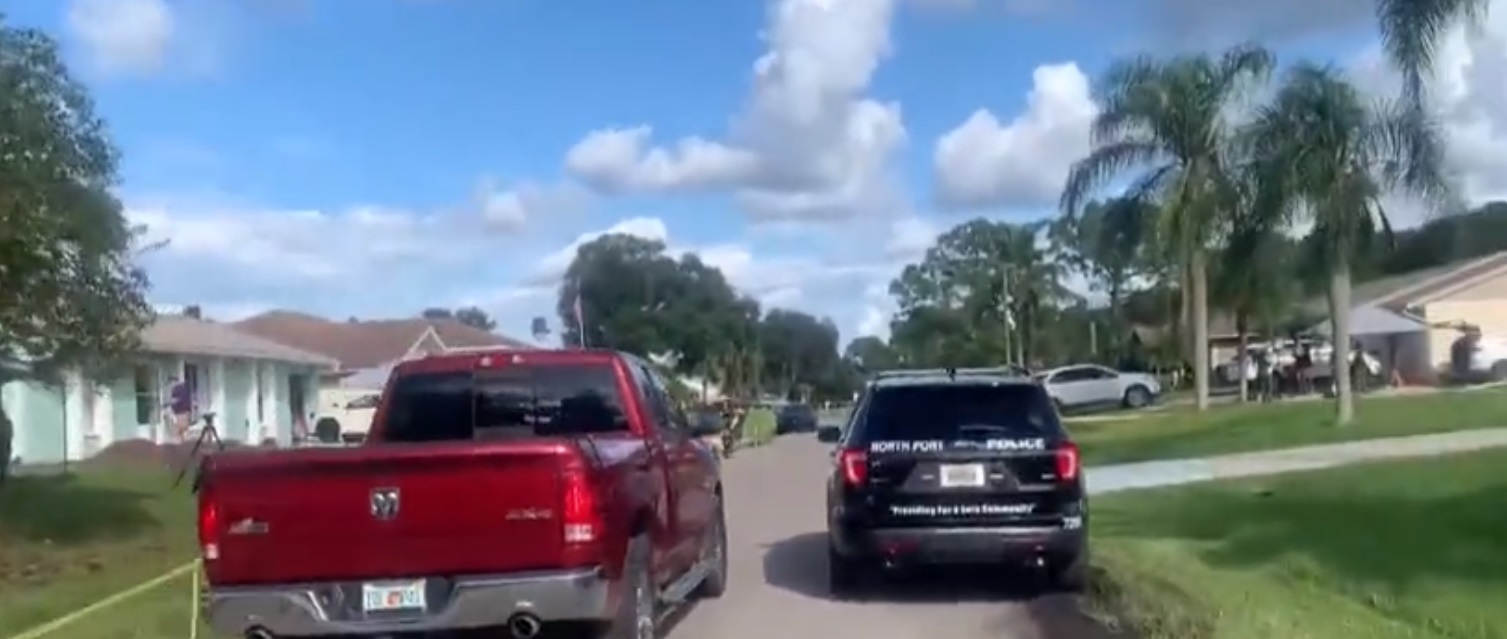 PHOTO Brian Laundrie Parents Ignore Media And Police After Returning Home From Orlando