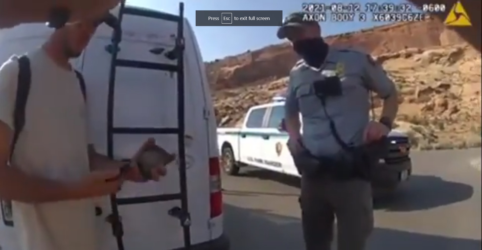 PHOTO Brian Laundrie Pulling His iPhone Out Of His Pocket To Show Moab Police