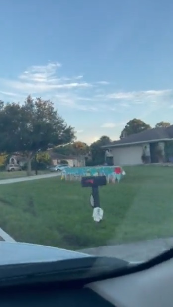 PHOTO Brian Laundrie's Parents Neighbor Put Up A Justice For Gabby Sign On His Front Lawn Down The Street From Their House