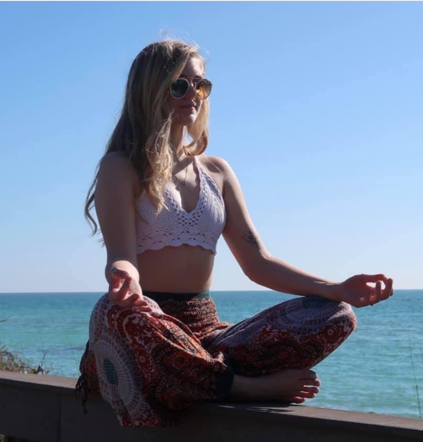 PHOTO Gabby Petito Meditating By The Beach