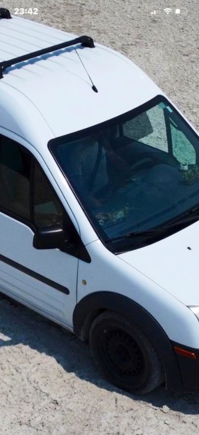 PHOTO Very Clear View Of Brian Trying To Hide In Van Driver's Seat Through From Dash Window