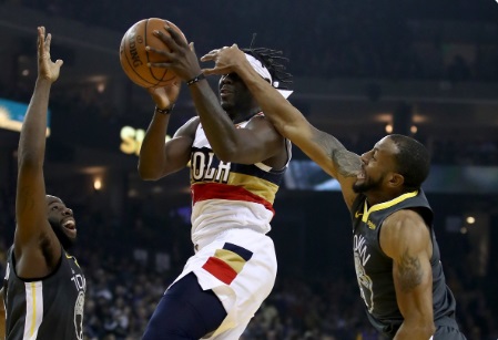 PHOTO Andre Iguodala Defends Jrue Holiday By Covering His Eyes With His Hand