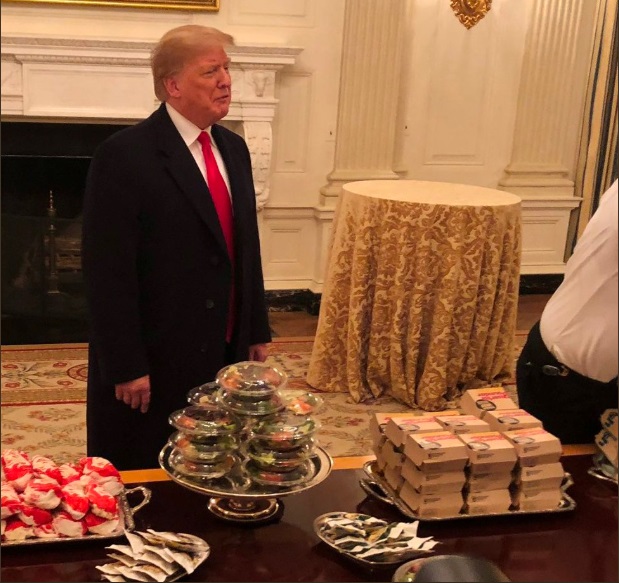 PHOTO Donald Trump Standing Next To Silver Platters Of Big Macs