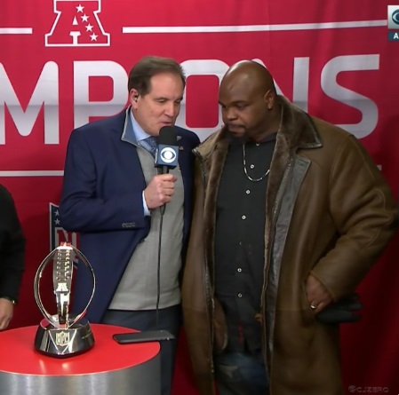 PHOTO Vince Wilfork Wearing Giant Brown Overcoat At AFC Championship Game