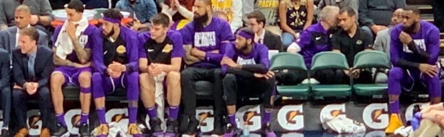 PHOTO Entire Lakers Bench Isolate Themselves From Lebron Arms Crossed While He Sits On End Of Bench