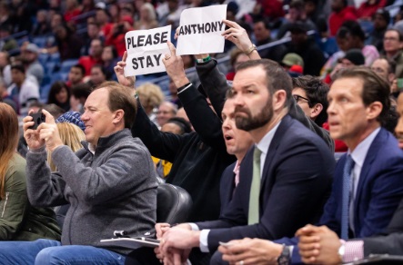 PHOTO Rich Courtside Fans In NOLA Hold Up Cheap Printer Paper Signs That Say Please Stay Anthony