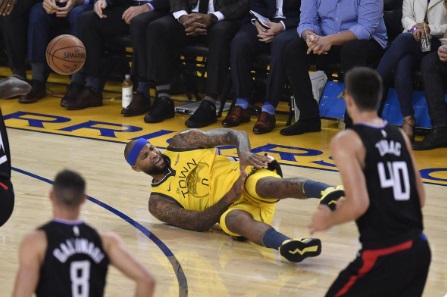 PHOTO DeMarcus Cousins Holding His Torn Quad To Keep It In Place