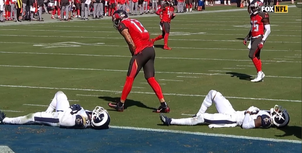 PHOTO FOX Cameras Caught TWO Rams Players Laying On Their Backs Between WR Mike Evans