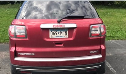 PHOTO GMC Owners Minnesota License Plate Says 069 Men