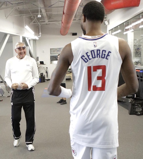 PHOTO Jerry West Smiling At Paul George Seeing Him In A Clippers Uniform In The Practice Facility