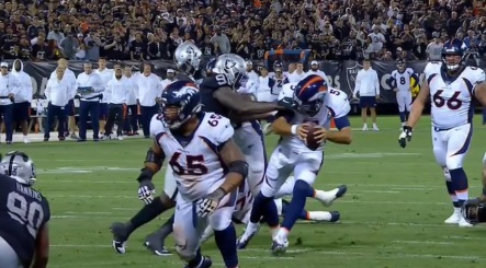 PHOTO Raiders Defender Hooks Broncos RB By The Facemask