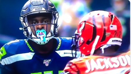 PHOTO Seahawks DJ Metcalf Wearing Mouthguard That Looks Like Pacifier