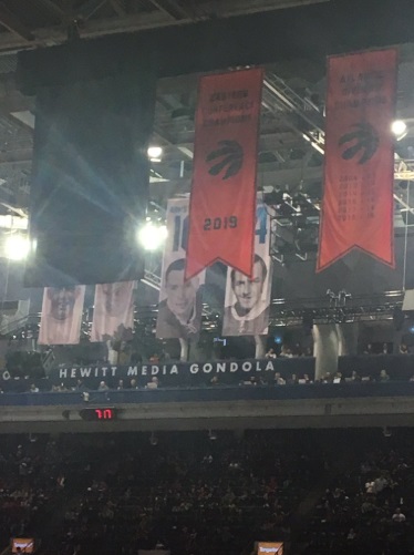 PHOTO Raptors Took Down Seperate Division Title Banners And Replaced It With One