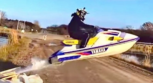 PHOTO Minnesota Jet Skiier Jumps Over Road From Pond To Pond