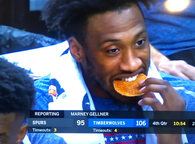 PHOTO Robert Covington Eating A Waffle On The Bench