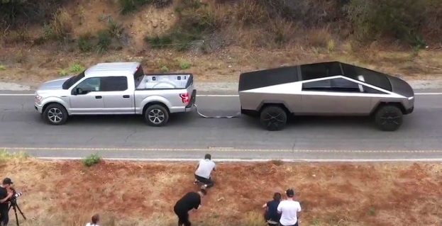 Photo Tesla Cybertruck Loses In A Tug Of War Between The F 150