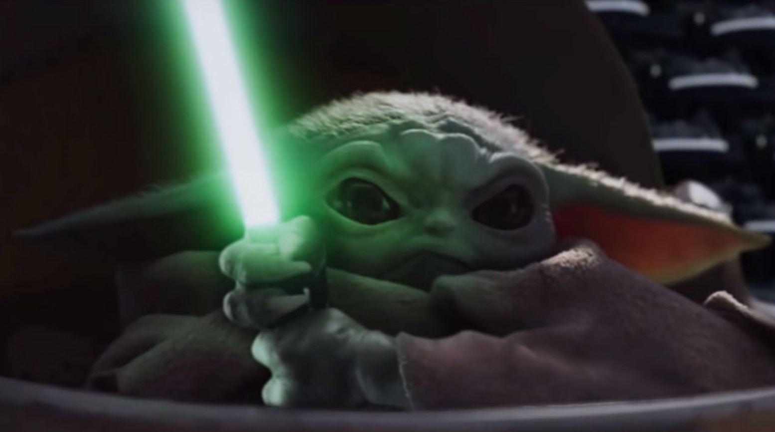 PHOTO Angry Baby Yoda Raising His Green Light Saber