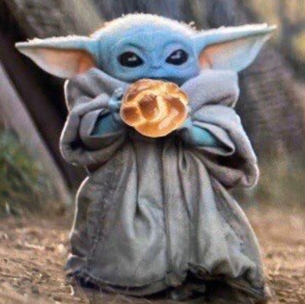 PHOTO Baby Yoda Eating A Huge Pretzel