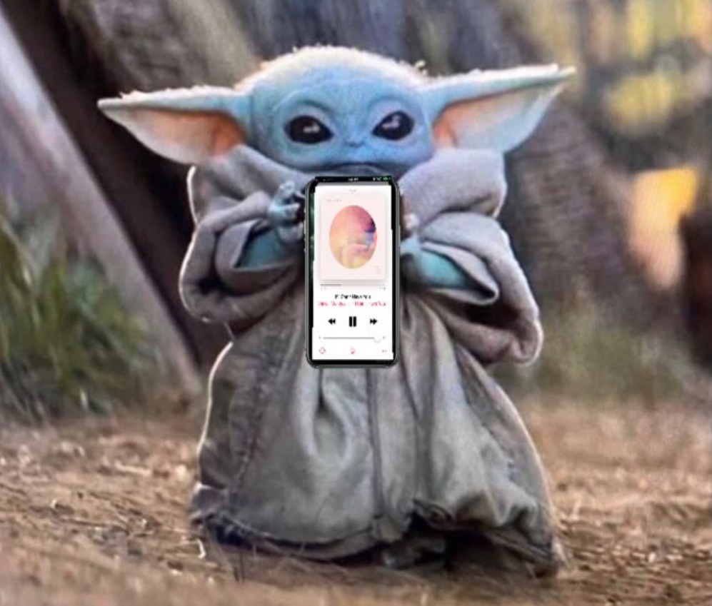 PHOTO Baby Yoda Holding An iPhone