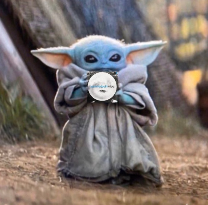 PHOTO Baby Yoda Looks Cute Holding Summerteeth By Wilco